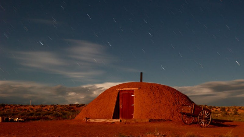 Traditional Navajo hogan dwelling under a starry night sky in the desert landscape. - Traditional Navajo hogan dwelling under a starry night sky in the desert landscape., tags: en - pexel